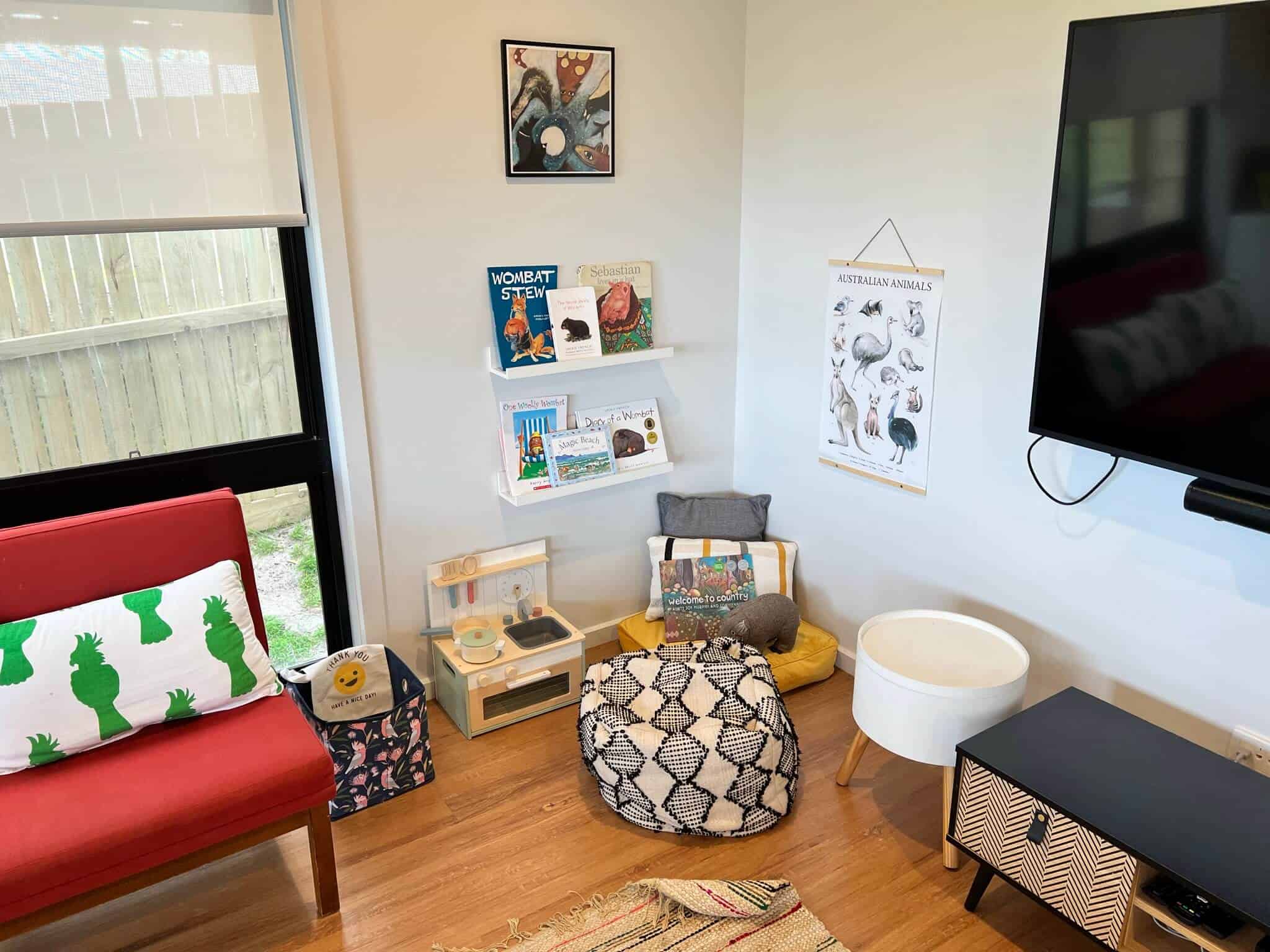 Children's play area with kitchen, books and LEGO